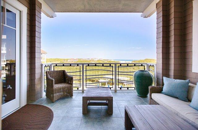 Compass Point 305 offers sweeping views of the coastal dunes and the Gulf of Mexico from all rooms! This recently renovated home offers approximately 1,434 square feet, 2 bedrooms, 2 baths, and an assigned parking spot with additional storage for beach gear in the covered garage below. The interior includes; raised ceilings, floor to ceiling windows in the great room, surround sound, distressed oak throughout, stainless steel appliances, custom cabinet pantry, quartz countertops in the kitchen and granite countertops in baths. Entering the unit you are welcomed by the straight on gulf views. The great room divides the bedrooms creating a private oasis for your guests. There is also a private laundry off the entry. The exterior space features a large private balcony that can be accessed