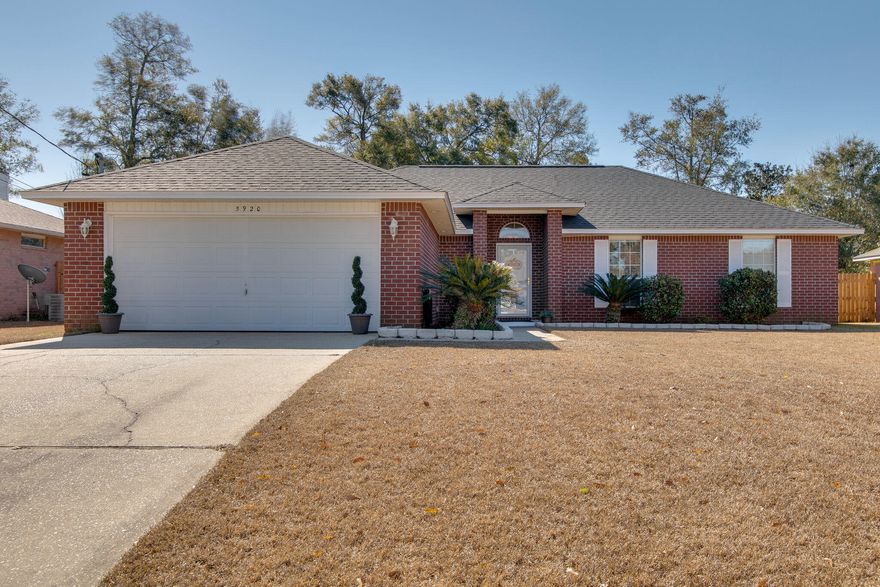 This 4/2 home located in Ashton Woods is a fantastic opportunity for both buyers and investors.  The oversized kitchen is refreshingly large with an island in the center providing extra workspace.  Boasting a true split bedroom floor plan, one side of the home contains the master suite with walk-in closet, double vanity and separate shower and tub.  On the other side of the home you will find the other three nicely sized additional bedrooms and the second full bath.  Gorgeous laminate flooring can be found in all of the living spaces of the home and tile has been placed in all wet areas.   Relax in your living room by the fireplace, or venture out back and roast marshmallows on your own personal outdoor firepit.  The backyard has plenty of space to play, entertain, or install a pool!