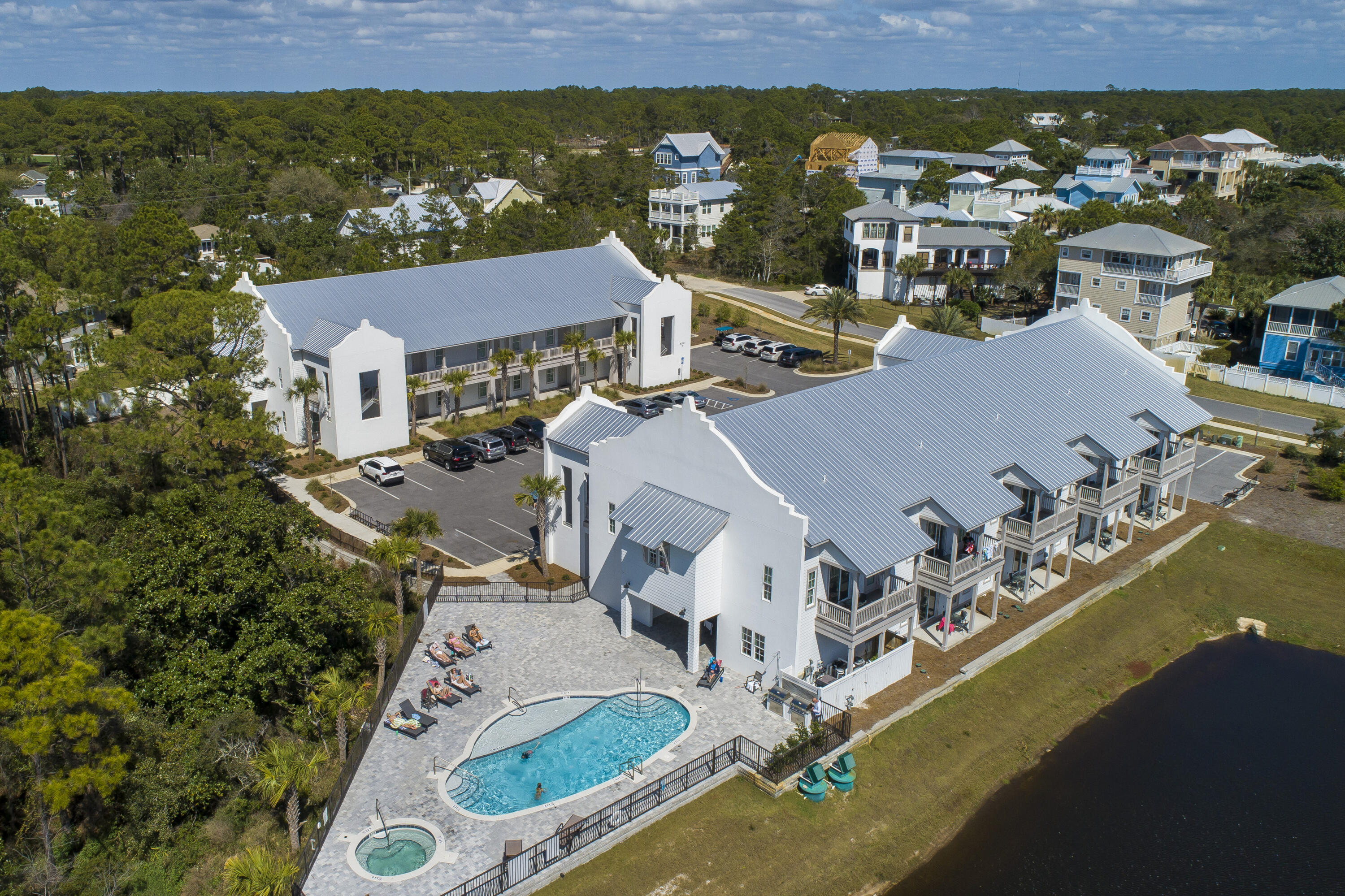 Enjoy listening to the sound of crashing waves from the Gulf while you relax on the terrace of this new three-bedroom two bath Azure of 30A unit. Experience the laid-back quiet environment afforded you in this exclusive 19-unit complex. Just steps away from two beach accesses you can take a leisurely walk to the beach to enjoy evening sunsets. Azure of 30A features a resort style heated pool and a separate spa for you and your guest's year-round enjoyment. Developed by premier builder, Cole construction, units include features such as Mohawk flooring, 10-foot ceilings throughout, 8-foot solid shaker panel doors, smooth finished interior walls and shaker style cabinets with quartz countertops. Three full bedroom units, third BD set up with custom built in bunk beds.