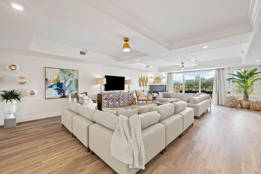 FULLY RENOVATED 2 story condo with stunning views of Redfish Lake and the Gulf!  Buy now to enjoy $50,000 in upcoming rentals from now - July 31, 2023. Impeccably updated from floor to ceiling and showcasing new designer furnishings. An entertainer's delight living more like a home with over 4,000 SqFt sprawling with large private covered balconies on both levels. Uniquely, this condo has an exterior entrance on both levels, meaning no stairs to go up if you choose. 4 bedrooms, one on main level and 4 private baths, large walk-in closets, expansive breakfast bar and kitchen with large walk-in pantry. Sanctuary at Redfish has unmatched amenities with four pools offering options of heated, zero entry, adult only or a hot tub, fire pit, gas grilling area, large fitness center, gated entry,