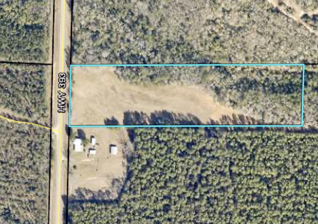 10 +/- acres Paved HWY frontage! This beautiful parcel of farmland is partially cleared and completely fenced with 2 metal gates. There is a pole barn with a 12 x 12 enclosed area which houses the pump for the 345 ft deep private well and 80 gallon water tank. Whether you are considering building your dream home or you just want a peaceful country retreat for farming or livestock, This property should be at the top of your list. There is a nice little stream that runs toward the back of the property, and plenty of high and dry land to set up your country estate or mini farm.