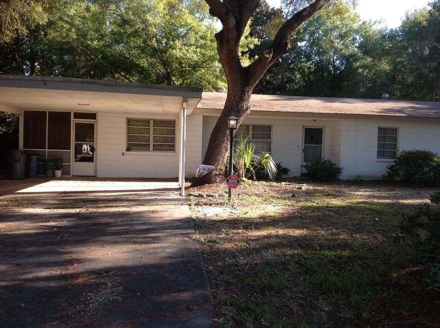 Enjoy ''Old Destin'' charm in this cozy 3BR/2BA home. Inside you will find beautiful hardwood floors that line the main living areas. Plush carpeting can also be found throughout the home and has been installed for additional comfort. The dining area is separated from the additional den, providing more room to entertain. Outside is a large, fenced in backyard accompanied by a screened porch. There is even enough room in the side yard to park an RV or boat trailer. An alarm system and yard maintenance is included in the rent. This rental is dog-friendly pending owner approval and deposit. We are sorry, no cats, snakes or rodents will be considered. The storage shed onsite is not available for use.