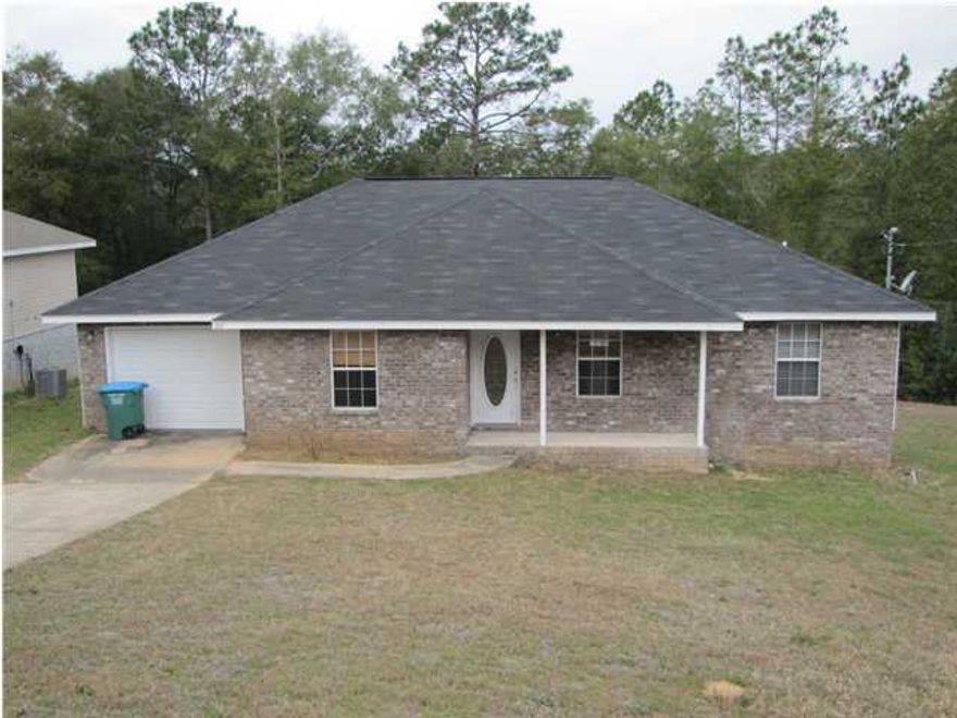 Wood floors and tile are throughout this well appointed house in Crestview. This home features a huge kitchen with tons of cabinets and dining area. You will appreciate the vaulted ceiling, split bedroom design, large walk-in master closet, large indoor laundry room, and big 20'x 10' deck. This home is available now and a small pet is okay with pet fee but no smoking in the home please.