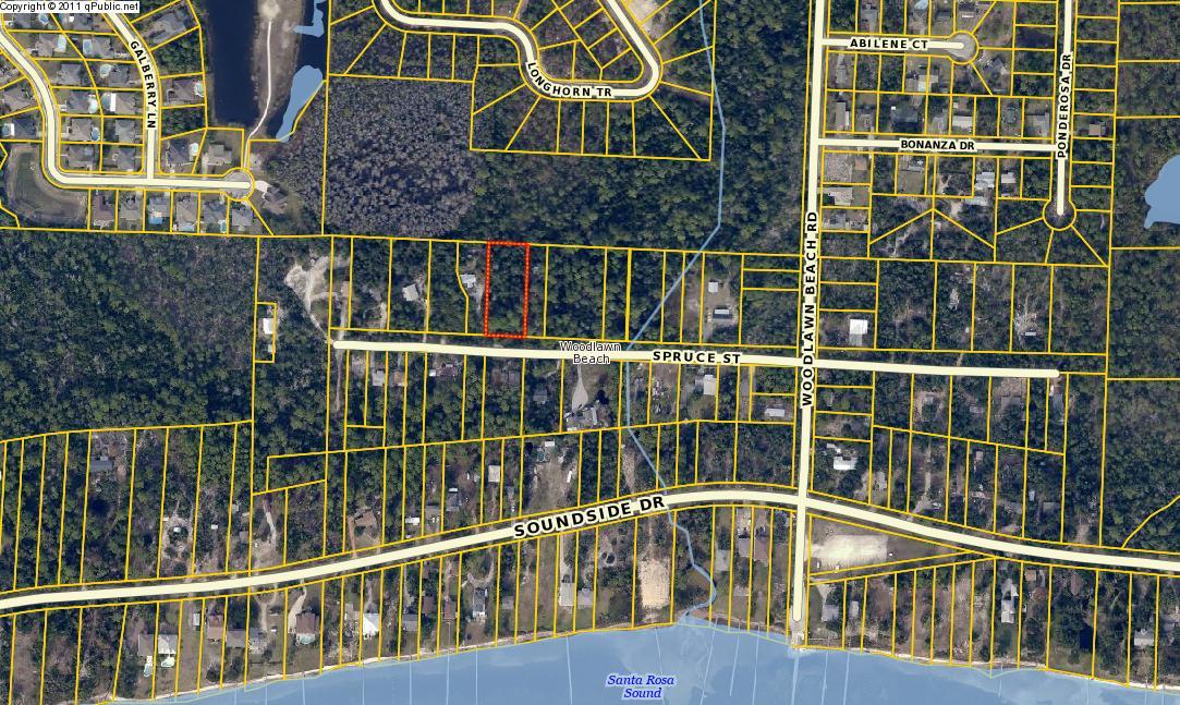 High and dry, water-privileged large double lot with mature trees including live oak and magnolia. Newer community boat launch and fishing pier, with ample parking for boat trailers, on the Santa Rosa Sound. This parcel backs up to protected state land. Design your driveway for maximum privacy using the natural flora indigenous to the area which will require no maintenance or irrigation. Property has been percolation tested and approved to build home. Water view possible with a two story home. No HOA. Live the simple, quiet, country life with boating, fishing and jet-skiing at your front door.