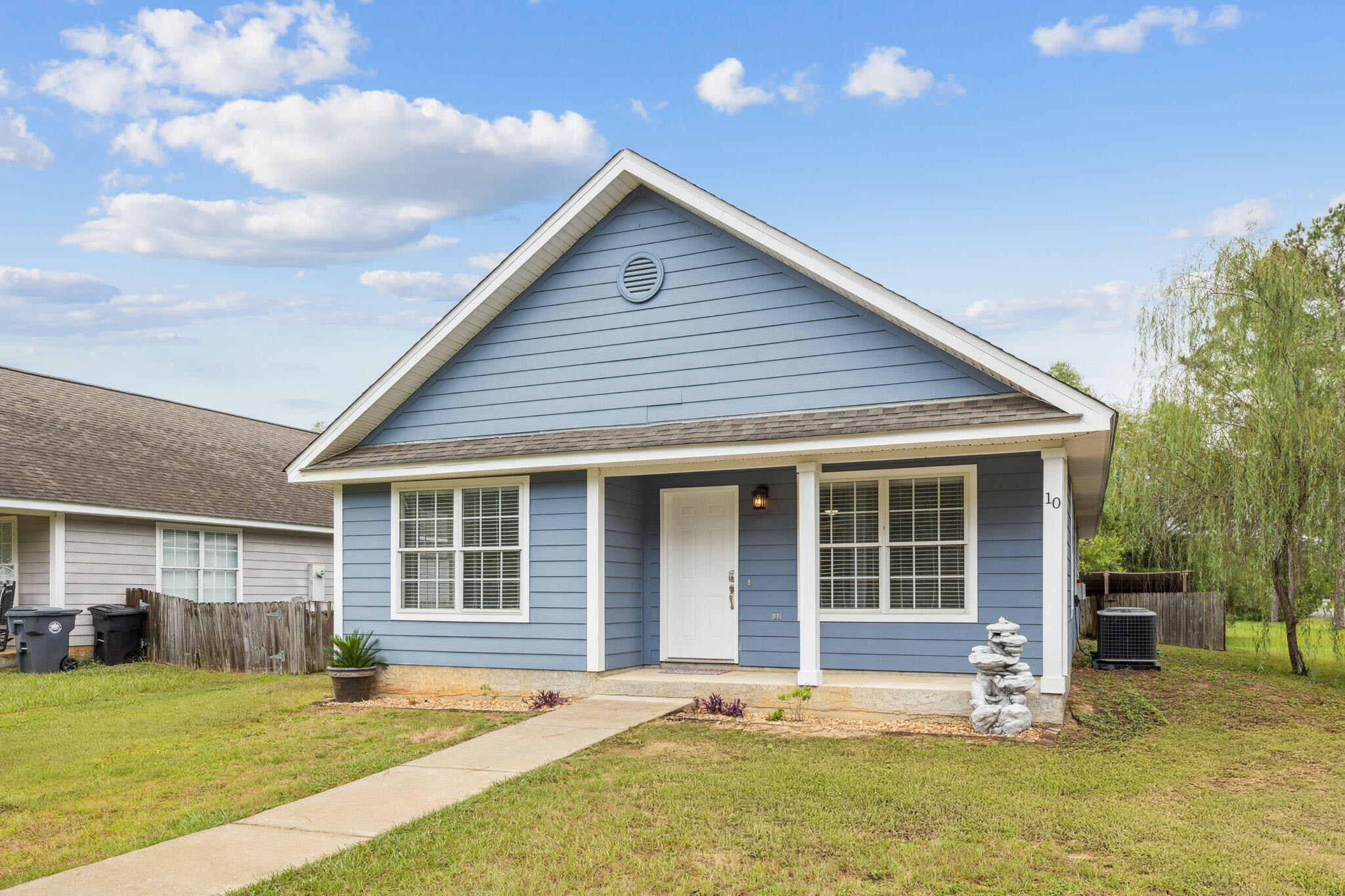 Affordable living in North Santa Rosa Beach! This 3 bedroom 2 bath home has an open floor plan upon entry with vaulted ceilings complementing the living room, dining area and kitchen. Fresh paint throughout the interior as well as brand new carpet in all bedrooms. The master bedroom is complemented by 2 walk in closets and private bath. Both guest bedrooms have spacious closets as well. The large laundry room also couples as a pantry area. Exterior features include hardi- board siding, concrete parking pad and sidewalk, covered front porch, fully fenced backyard with side deck/paver area, and a covered storage area in the back yard. Situated near Cessna Landing Public Boat Ramp, 30A's stunning beaches, and a variety of shopping and dining options.