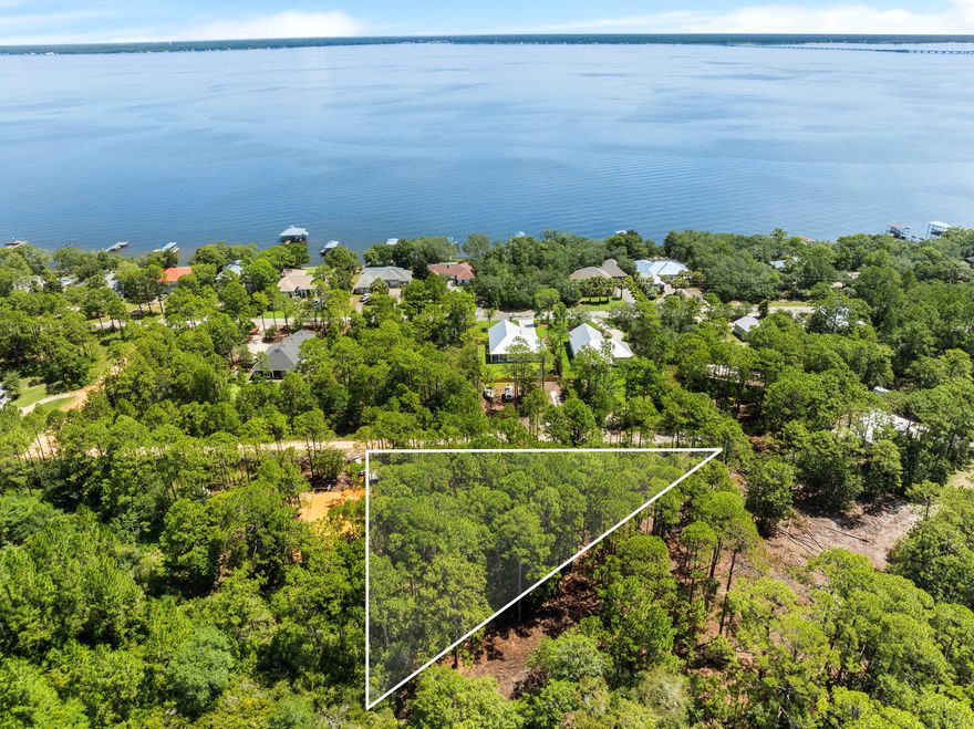 An incredible opportunity with NO HOA is now available to build your dream home in a highly desirable area in Santa Rosa Beach!This vacant lot, ready to build, presents an exceptional canvas for your dream retreat. The property sale includes home building plans for a 2,714 SF home with a 2-car garage. The home includes 3 bedrooms, 2.5 bathrooms, 2 oversized porches, his/her closets, and many more well thought out details to make this home ideal for any buyer.This homesite is convenient to a boat launch, Kellogg Park, with access to both the Choctawhatchee Bay and the beautiful white sand beaches of the Gulf Coast.The combination of privacy, location, shopping, and dining makes this homesite an ideal choice for constructing your beach getaway. Imagine yourself living in thi community filled with hundred year old oak trees and just minutes away from the World's most beautiful beaches! 

Make this beautiful homesite yours TODAY! Buyer to verify all information.