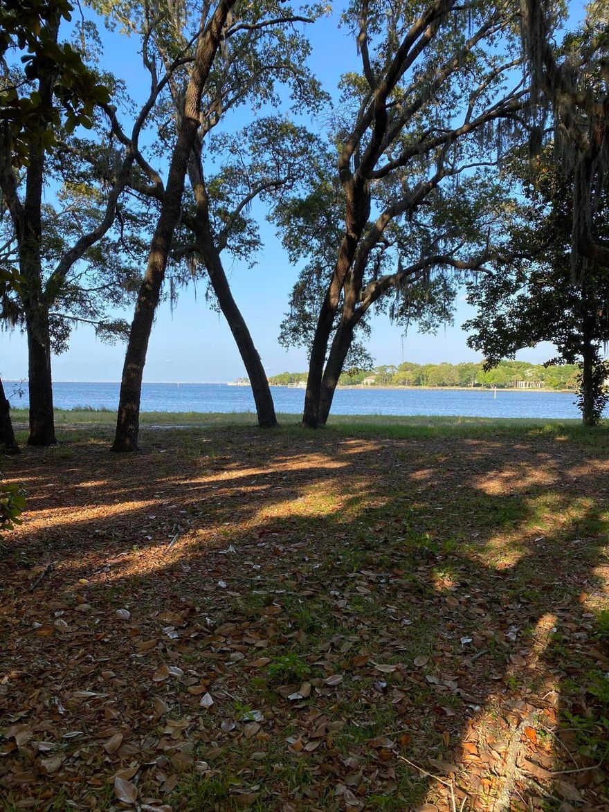 The exclusive gated community features only 13 homesites on Choctawhatchee Bay. This lot features 145 feet of bay frontage, with deep water, and with easy Gulf & Harbor access, making this the perfect spot for those with a passion for boating. Enjoy the communities beautiful landscaping along with the shared sitting area area for those in the community to enjoy. Live the best of both worlds with the convenience of living minutes away from everything Destin has to offer as well as being able to come back home to your private water front paradise. Lot was recently brush cleared