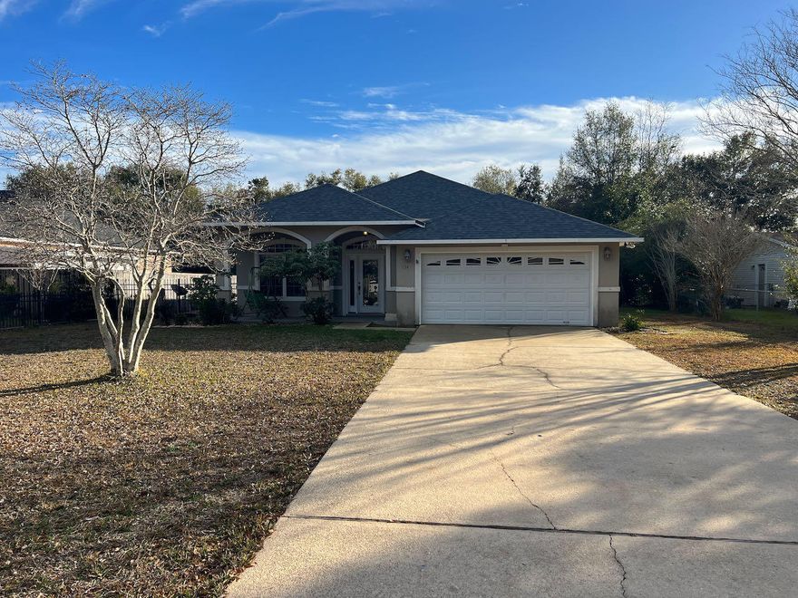 Home in the heart of Shalimar, Florida! This spacious 3-bedroom/ 2 full bathroom house comes with an additional office space, perfect for remote work or study. Separate laundry room right off the kitchen. Nestled on a generous lot, the property offers a private and fenced backyard. The well-designed layout includes three bedrooms, allowing for comfortable living arrangements. The dedicated office space provides flexibility for those who work or study from home. Situated in close proximity to Eglin Air Force Base, commuting is a breeze. Enjoy the convenience of being near local grocery stores, schools and a variety of restaurants, making it easy to explore the vibrant community.