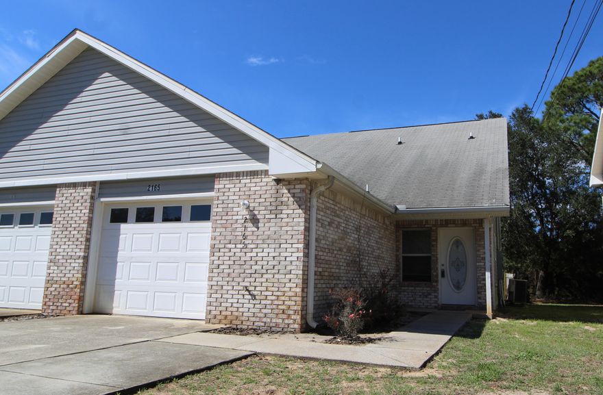 WHY RENT WHEN YOU CAN BUY? Nice move-in-ready townhome situated on a quiet street close to everything! Spacious living area with high vaulted ceilings and an open staircase. Dining area opens into the living room. Kitchen has lots of counterspace, breakfast bar , pantry and a door that leads out to the open patio perfect for grilling out. Master bedroom is conveniently located downstairs and good-size full bath. Upstairs is a small landing and two more bedrooms with a full bath. Oversize garage with washer and dryer that convey. Backyard is private and partially fenced. Close to shopping, schools, restaurants, beaches and Hurlburt AFB. Call today to set up your own private viewing!!