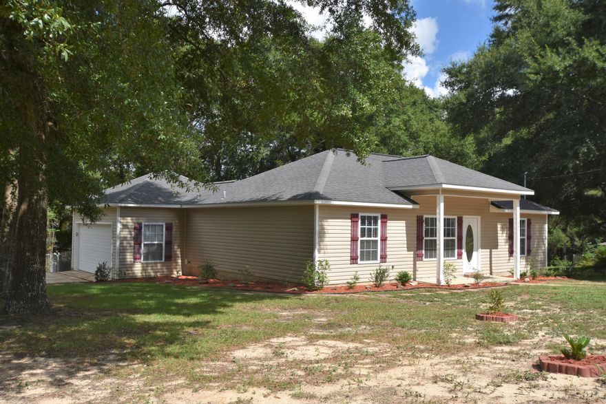 Ready to move-in! Seller pays most closing costs for you, including a one-year home warranty.A well maintained home (owner has some touch up painting and will replace the back door). Large corner lot with a chain link fenced back yard is great for ALL including those 4-legged family members! Popular split bedroom plan has little wasted space. Step into the Living Room and you will feel the spaciousness of the 10 ft high ceiling. The Kitchen is equipped with all of the appliances: smooth top self cleaning range, refrigerator w/ice maker, built-in microwave and dishwasher. The MBR has a 6'5 x 5'7 walk-in closet. All Bedrooms and the Living Rm have lighted ceiling fans. Closing costs paid by seller does not include: 1st yr insurance,home inspection,prepaids,escrow items. See it today!