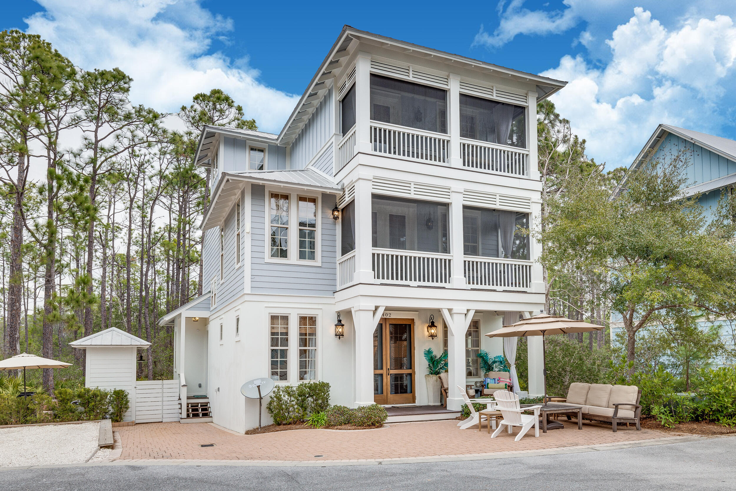Welcome to 402 Redbud Lane, a stunning 4-bedroom, 4-bathroom, 3-story vacation home nestled within the highly sought-after Treetop development in Inlet Beach, Florida. This exquisite property offers a luxurious coastal living experience, boasting an array of desirable features and a prime location.Step inside this meticulously designed home and be greeted by an abundance of natural light that floods the open-concept living space. The main level showcases a spacious living room, perfect for entertaining guests or relaxing with family. The modern kitchen is a chef's dream, complete with high-end appliances, ample counter space, and a convenient dining area with built in benches with plenty of seating. In addition to the main living areas, the main level also features a bedroom and bathroom, providing a private retreat for guests or family members. Convenience is key, and this home offers a side door that is conveniently located near the outdoor shower, providing easy access to rinse off after a day at the beach. The side door also leads to the first-level laundry room, making it effortless to clean up and refresh before stepping inside.
One of the highlights of this home is the bunk room, featuring four built-in bunks. This room is the perfect place for guests, providing comfortable accommodations and a fun, inviting atmosphere. Capitalize on rental income by offering this unique sleeping arrangement to vacationers, maximizing the home's potential for investment returns.
The outdoor amenities of this property are equally impressive. Embrace the coastal lifestyle with the outdoor shower, perfect for rinsing off after a day at the beach. Enjoy evenings cozied up by the outdoor fire pit with your guests and family. The main and second levels of the home feature screened-in porches, offering serene views of the surrounding lush greenery and providing the ideal spot for enjoying your morning coffee or unwinding after a day of beach activities.
The home, situated at the end of a quiet cut-de-sac, is being sold fully furnished, making it turnkey ready for the new owners. Every detail has been thoughtfully considered, ensuring a seamless transition into your beach paradise. Whether you plan to enjoy this property as a personal retreat or as an investment opportunity, everything you need is already in place.
As part of the Treetop development, residents of 402 Redbud Lane have access to a private community pool, providing a refreshing oasis just steps away from your front door. Additionally, enjoy deeded beach access and a convenient tram service that will pick you up at the home and transport you directly to the beach access located at the Villas at Sunset Beach Condos.
The Treetop development offers a gated community for added security and peace of mind. With easy accessibility from Highway 98 and entry into Seacrest Beach, you'll have no trouble exploring the enchanting coastal towns along 30A. Take a leisurely stroll or bike ride to Seacrest Beach, Rosemary Beach, Alys Beach, and discover the vibrant array of shops, restaurants, and entertainment options that await you.
Don't miss this incredible opportunity to own a meticulously designed and fully furnished vacation home in the coveted Treetop development. Embrace the coastal lifestyle and create unforgettable memories in this picturesque Inlet Beach retreat. Schedule your private showing today and make 402 Redbud Lane your own piece of paradise along the stunning Emerald Coast.