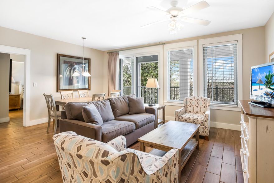 This top floor Pilot House condo's location is close to all of the shops, entertainment, and dining of the Village of Baytowne Wharf while still allowing you to have a serene vacation getaway. With three rental capabilities (1-bedroom, 2-bedroom, or studio), this condo is a perfect primary/secondary home or vacation rental. Enjoy the ease of cleaning the new wood plank floors. Updated furniture and new countertops in the kitchen and bathrooms, make this the perfect home away from home. Owners can take advantage of the extra storage in the unit's owners closet or they can store larger items in the storage cage located in the parking garage. Pilot House owners have exclusive access to the lushly landscaped amenities terrace featuring a resort style pool, fitness center, lawn, and lovely grilling area as well as to the Founders Club, featuring a game room with pool table and bar and a balcony overlooking the events plaza. Enjoy peaceful living while being conveniently close to the shopping, dining, and night life hot spots in the pedestrian Village of Baytowne Wharf.

As an introduction to the Sandestin lifestyle, we invite our new owners to explore amenities that make Sandestin special. The listing brokerage and seller(s) are presenting the buyer(s) of this property with (2) 90-minute rounds of Tennis court time, a golf foursome at one of our three championship courses, and a round of golf for up to four (4) players at the unrivaled Burnt Pine Golf Club.

Sandestin Golf and Beach Resort is a major destination for all seasons and all ages, and has been named the #1 resort on Florida's Emerald Coast. This magical resort spanning over 2,000 acres is comprised of over 70 unique neighborhoods of condominiums, villas, town homes, and estates. The resort features miles of sandy white beaches and pristine bay front, four championship golf courses, a world-class tennis center with 15 courts, 4 resort swimming pools (and 15 private neighborhood pools), a 123-slip marina, a fully equipped and professionally staffed fitness center and spa, meeting spaces and The Village of Baytowne Wharf, a charming pedestrian village with events, shopping, dining, family entertainment and nightlife. For true golf cart community living, Grand Boulevard is just outside the resort gates and provides access to additional shopping, dining and entertainment  all without traveling on Hwy. 98.  Come to Play, Stay for Life!