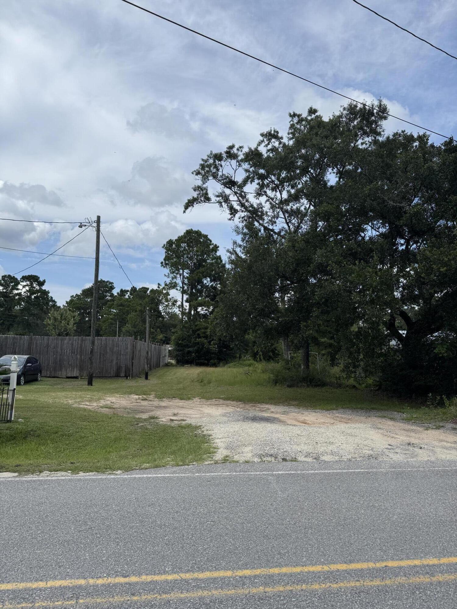 Located in the heart of Black Creek Lodge Rd, this lot is cleared and ready for a new family to enjoy! Enjoy a short drive to the sugar-white sands and vibrant communities of Scenic Highway 30A, or head to nearby Choctawhatchee Bay for world-class fishing and boating. Whether you're looking for a weekend escape or a full-time residence, this location offers the perfect blend of tranquility and convenience.