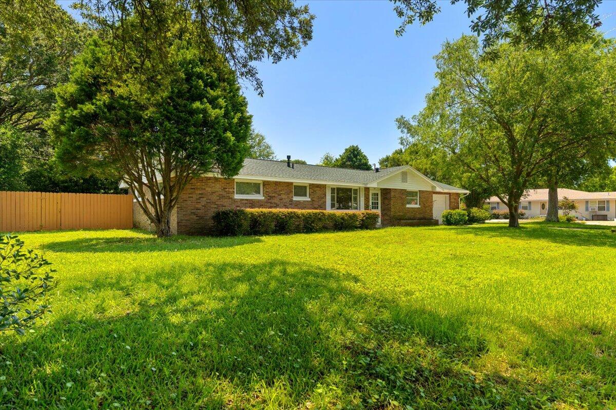 Beautifully well maintained home with a freshly painted kitchen cabinets, brand-new stove and dishwasher, brand new Roof replaced in Nov 2024 and a garage door for added privacy. Enjoy the serenity of the lush gardens that surround the property. Located walking distance of parks, Fort Walton Beach Rec Center, shopping, and more. Just 1.6 miles from a public access to Cinco Bayou and 3 miles to the Gulf--perfect for nature lovers and beachgoers. This charming home blends comfort, convenience, and tranquility in one of the area's most desirable locations. Don't miss this opportunity!