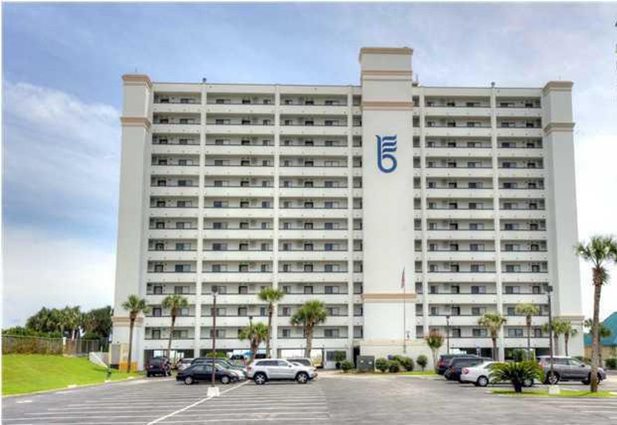 Fabulous beachfront condo in popular Breakers East. Unit 101 is a quiet end unit on the second level, and it comes with a covered assigned parking space just below. Want to leave a car at the beach....this is the unit for you! Take the elevator, or skip it and take one flight of stairs up and you are at your front door. This condo is pristine clean with updated furnishings. Unusually large, 2BD/2BA with 1,453 square feet. Guest room has two queen beds. Kitchen is fresh with white cabinets and appliances. Owner customized unit with crown molding in living/dining area, new interior doors, additional privacy door to guest suite. Screened front door on unit to let the gulf breezes flow. Enjoy gulf views from kitchen, living/dining, and master bedroom. Access your 30 ft. balcony