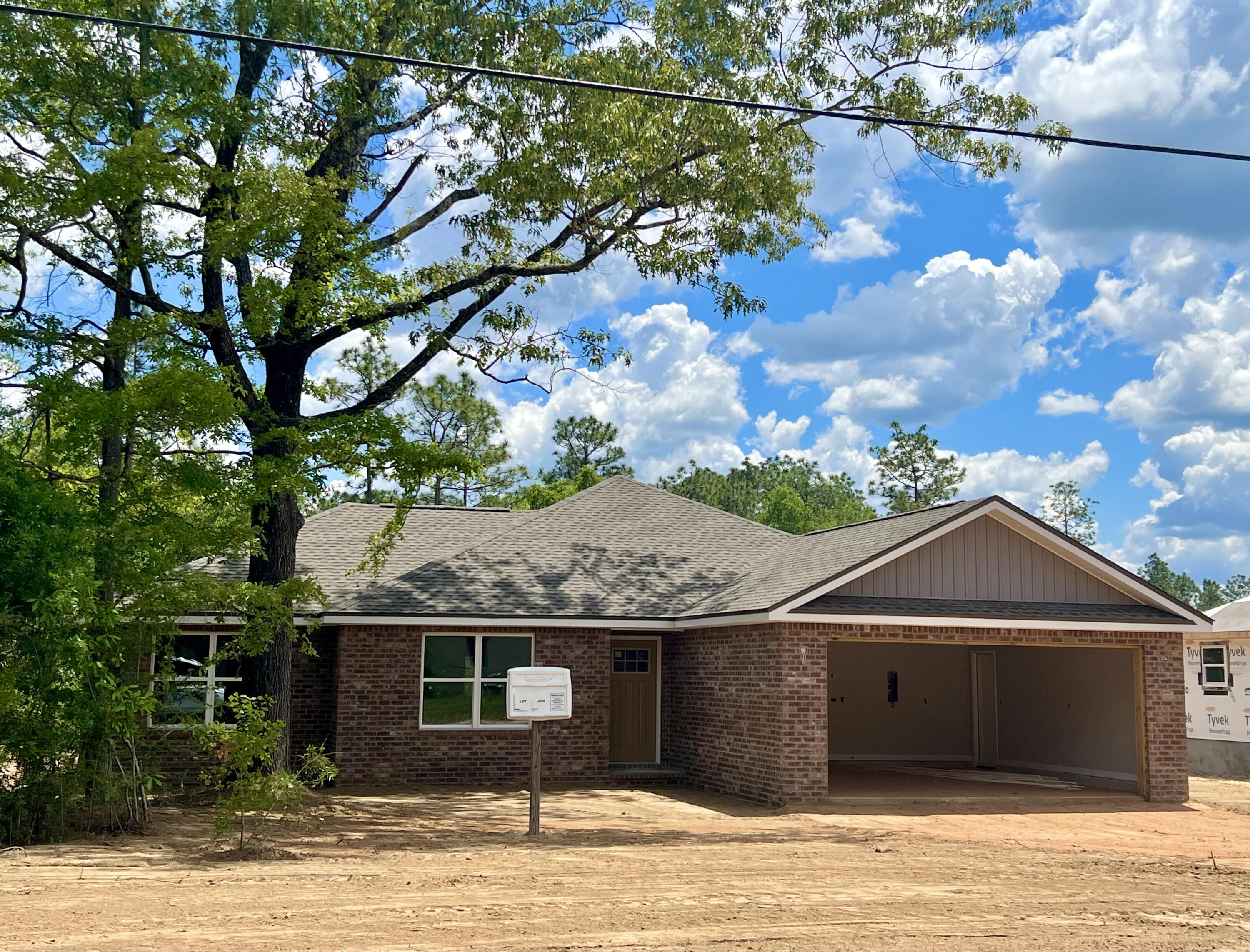 Quality NEW CONSTRUCTION built by Award Winning Parade of Home Builder. Attention to detail is evident in this beautiful 3 bd/2 ba home that is situated on a full 1 acre lot  The home features a brick front and 2 car garage. Luxury Vinyl Plank and neutral colors  are consistent throughout the home. The home boasts an open floor plan, white cabinets and quartz countertops.  Three nice size bedrooms. Indoor laundry room. Covered back porch. Deep level lot. Buyer to satisfy themselves as to zoning, school zones, sq footage, lot dimensions and any other factors deemed important, Listing agent is related to seller. ESTIMATED DATE OF COMPLETION IS JUNE 15, 2022. Note - Interior photos are reflective of a home built by the same builder and showing similar finishes. There will be no breakfast bar.