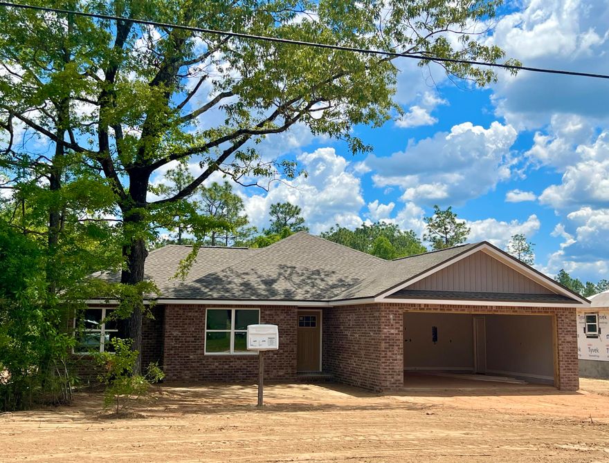 Quality NEW CONSTRUCTION built by Award Winning Parade of Home Builder. Attention to detail is evident in this beautiful 3 bd/2 ba home that is situated on a full 1 acre lot  The home features a brick front and 2 car garage. Luxury Vinyl Plank and neutral colors  are consistent throughout the home. The home boasts an open floor plan, white cabinets and quartz countertops.  Three nice size bedrooms. Indoor laundry room. Covered back porch. Deep level lot. Buyer to satisfy themselves as to zoning, school zones, sq footage, lot dimensions and any other factors deemed important, Listing agent is related to seller. ESTIMATED DATE OF COMPLETION IS JUNE 15, 2022. Note - Interior photos are reflective of a home built by the same builder and showing similar finishes. There will be no breakfast bar.