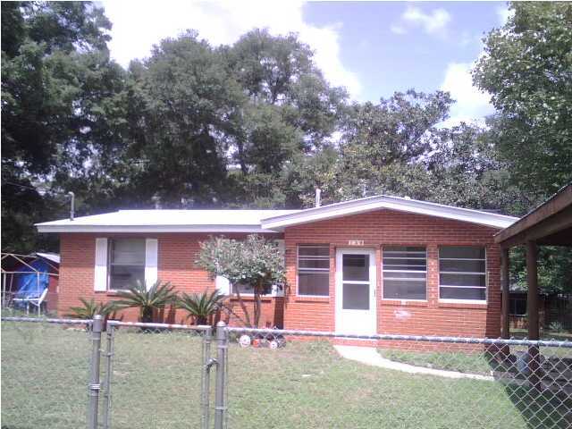 This 3 bedroom, 2 bath home is located on a huge fenced lot. Beautiful floors, plus a nice sunroom on the front make this home a great find. Separate 1-car carport, plus a workshop with power. Master bath has shower only. Pets welcome with owner approval and a $250 non-refundable pet fee. Smoking not allowed.
