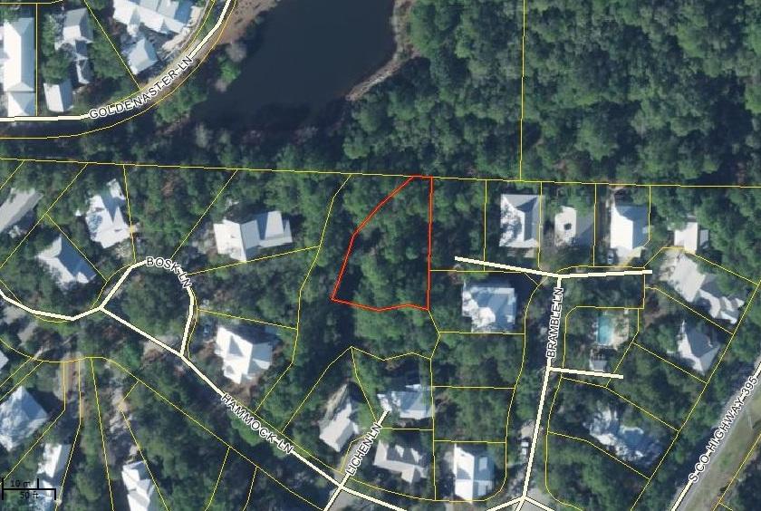 Largest lot for sale in The Hammocks of Seagrove Beach ... over .2 Acres! Recently surveyed with Boundary survey and setbacks identified due to 25' wetland buffer surrounding this lot. County has approved the buildable lot size...see documents section for downloadable survey. Two pools in this private gated community. All dimensions are estimates and buyers should verify that which they deem important. This is part of an Estate sale with agent/ownership interest.