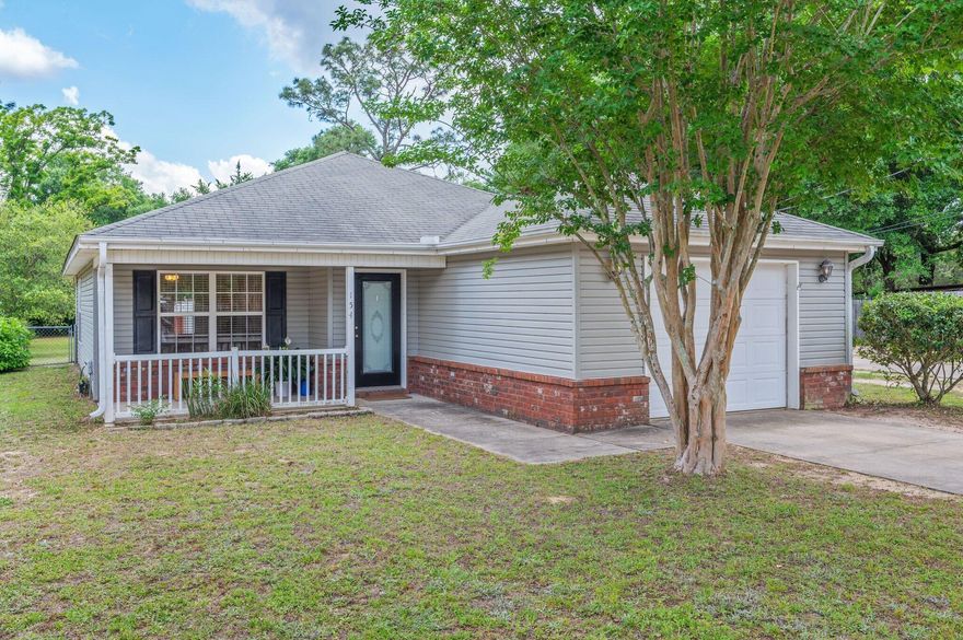 Centrally located and full of potential! This charming 3 bedroom, 2 bath home features an inviting front porch, perfect for your favorite rocking chair. Inside, you'll find a functional open layout with a spacious living room, dining area, and kitchen with a large breakfast bar. Currently used as a rental, the home offers a great opportunity for cosmetic updates to match your personal style. Seller will provide a brand new roof at closing, offering peace of mind for the next owner. The fenced backyard includes a covered patio and small storage shed. Conveniently located near schools, shopping, and commuter routes--don't miss this opportunity!