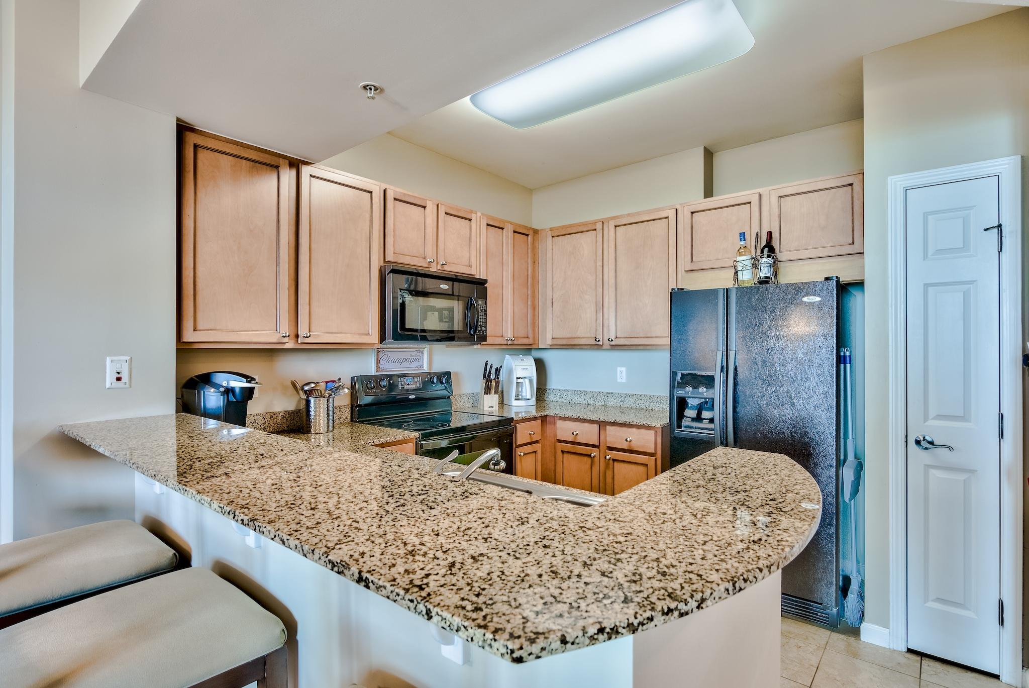 You can have it all with this gorgeous 5th floor unit with spectacular resort and gulf views! This unit comes fully furnished and rental ready! Outstanding rental income projections of $35k+! Kitchen boasts granite countertops and maple cabinetry. Master bedroom features a king bed with balcony access. Second bedroom has custom built full bed with extra storage.