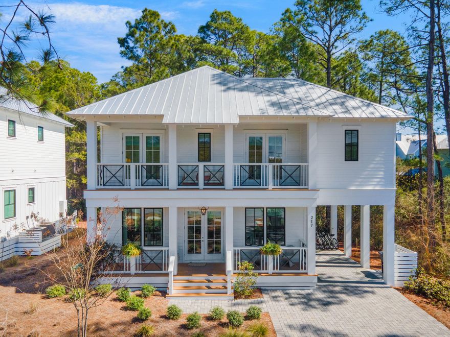 Just south of Scenic Highway 30A perfectly positioned in Seagrove Beach, 217 Lakewood is a captivating home offering both convenience and charm. This delightful property is an ideal setting for those who love the balance of vibrant community living and tranquil waterside experiences.Situated across the street from Eastern Lake, one of 30As largest coastal dune lakes, this home offers effortless boat access making it easy for you to enjoy water activities or peaceful moments by the shore whenever you wish. Additionally, its prime location is just moments away from the premier shopping and dining destinations of Seagrove, Seaside, Watercolor and Watersound Beaches, providing the perfect balance of leisure and accessibility. Inside, you'll be greeted by custom window treatments and unique furnishings that add a touch of elegance and character to every room. Two guest bedrooms each have a spa-like ensuite with double vanities and beautifully tiled showers. Two junior master suites complete the floor, each with custom walk-in closets. The thoughtfully designed layout enhances both privacy and openness, making it perfect for entertaining guests or enjoying quiet family moments.

The Cottages of Eastern Lake provide residents and guests with an impressive collection of amenities including a private pool, walking trails, lake access for launching of boats, kayaks, fishing, etc. The home is also just around the corner from three great regional beach accesses.

Whether you're drawn by the proximity to bustling amenities or the lure of the water, 217 Lakewood Dr. presents a rare opportunity to enjoy a lifestyle of comfort and convenience in South Walton. Experience this exceptional home for yourselfand schedule a tour today!