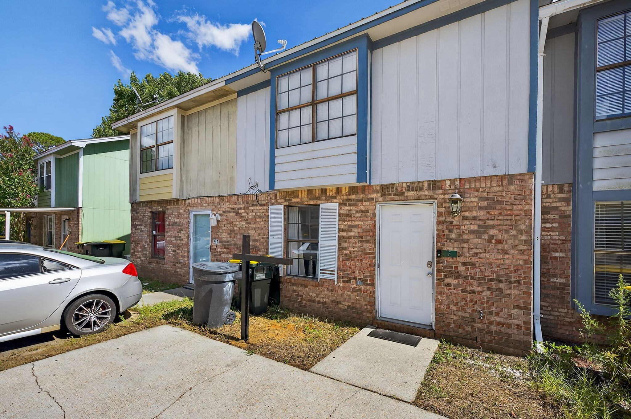 Move-in ready & centrally located near Eglin AFB and Hurlburt Field, this 2-bedroom, 1.5-bath home features a metal roof (2023), new water heater (2024), and a renovation completed in 2020. The first floor boasts tile flooring, an open kitchen with a large breakfast bar, generous cabinet space, and a convenient half bath. Upstairs includes LVP flooring, an updated full bathroom, a spacious primary bedroom with a walk-in closet, and a guest room with step-in closet. Enjoy a privacy-fenced backyard, open patio, and recent updates like gutters, back siding, and fence gate repairs. Don't miss your chance to view this property, schedule your private showing today!