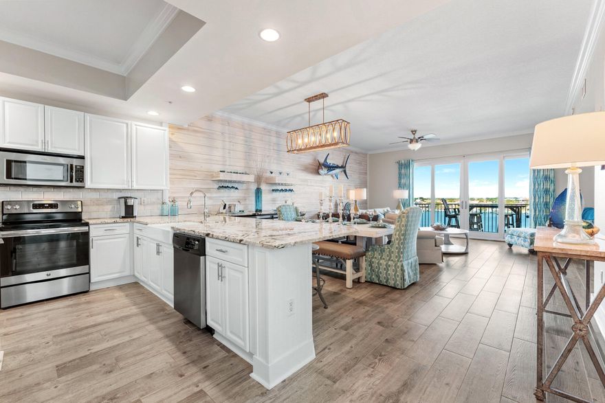 THIS IS AN OPPORTUNITY YOU DO NOT WANT TO MISS! This Beautifully Updated 2 Bed, 2 Bath Waterfront Residence Comes With Private Boat Slip, Climate Controlled Storage & Oversized Private Garage!  Features Include: Open Floor Plan, 10 ft Ceilings , Updated Flooring, Newly Painted,  Updated Bathrooms, Quartz Countertops, Updated Kitchen With New Stainless Steel Appliances, Backsplash, Shiplap, New Wet Bar With Wine Fridge, Expansive Balcony With Gorgeous Panoramic Views of The Gulf of Mexico & Destin Harbor! New HVAC & New H2O Tank 2021! Located in Harbor Lights, One of Destin's Premiere Buildings! A Gated, Low Density Condominium That Prohibits Short-Term Rentals! Amenities Include: Common Area, Paddle Board Storage, Owner's Only Beach Access, Conference Room & Beautiful Pool & Hot Tub.