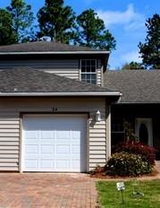 A pavered driveway welcomes you to a manicured front yard (maintenance included) and a single car garage leading directly to the gorgeous kitchen with granite counter-tops and stainless steel appliances. The open floor plan lives large with a tiled dining area off the kitchen, spacious great room and main floor master bedroom. Two sets of sliding glass doors lead to a private back patio with room for grilling. Upstairs you'll find two large additional bedrooms and a full bath. A full-sized Maytag washer and dryer are included and conveniently located off the kitchen. Also included is quarterly pest control service provided by Florida Pest Control. Anyone over 18 years planning on living in the home must fill out an application. No pets. No smoking.