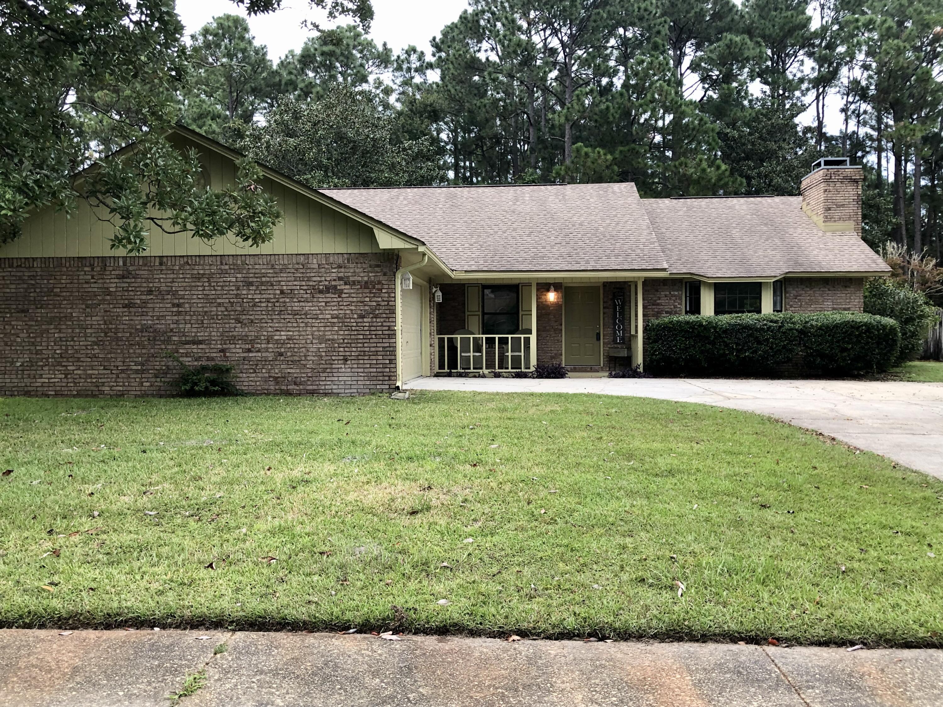 One owner brick home in OVERBROOK! This 3/2 home has new carpet and new appliances and has been freshly painted. It has a 12 x 24 workshop with power and air conditioning. The large yard backs up to Eglin property and has a new privacy fence and mature landscaping. Come take a look today! Homes don't last long in this neighborhood.
