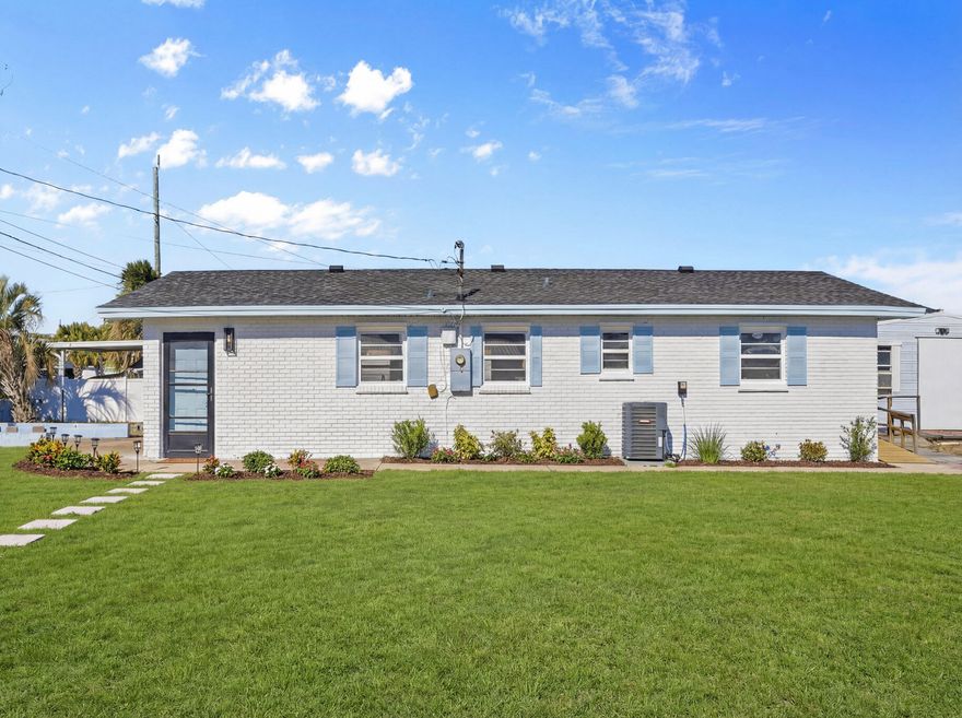 Welcome to 7008 Beach Drive, a solid, beautifully updated brick home located just one road off Thomas Drive--close to everything while still tucked away in a quiet, established area. This home has been completely renovated and updated throughout, offering a fresh, modern feel with quality finishes and a truly move-in-ready condition. Every space has been thoughtfully refreshed, giving the home a brand-new look and feel from top to bottom. Built with solid brick construction, this home offers durability, strength, and long-term value. The roof is less than five years old, and the HVAC system is only a few years old, providing peace of mind on major components. The structure is sturdy, well-built, and designed to last. Photos were taken when the home was approximately 95% complete, with only minor finishing touches remaining. Important note: Some photos include landscaping renderings for visualization purposes only. Final landscaping will be similar in style, but plants, layout, and materials may vary and may not appear exactly as shown. If you're looking for a turn-key, fully renovated home in an excellent location, this property delivers quality, style, and value without compromise. Measurements are approximate buyer must verify if important.