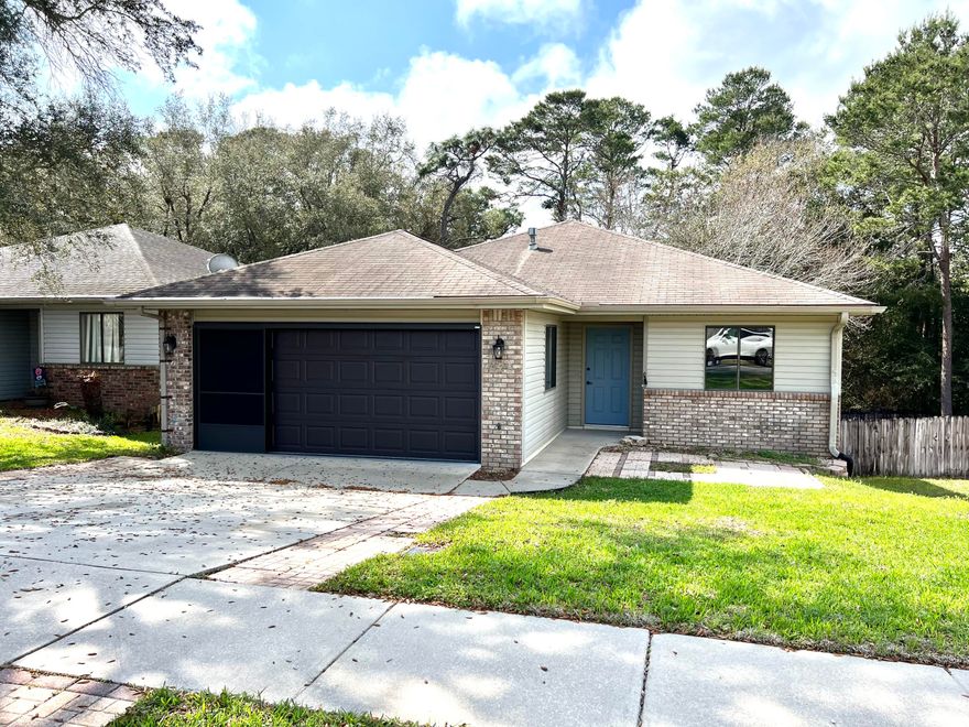 Great home has been lovingly updated. This 3/2 home offers an updated kitchen with stainless appliances & beautiful tiled backsplash. An abundance of windows allow in lots of natural light to make this home feel open & bright. Easy care flooring throughout makes maintenance a breeze. Spacious master bedroom has a large closet & master bath with lots of storage space. Enjoy the view from the screened porch overlooking the backyard & the natural area beyond. There is even a washer & dryer for your use. A 2 car garage finishes off this fine property. Owner will allow pets with restrictions. Any pet must be spayed/neutered, housebroken & current on all shots. Requires a non refundable pet fee. Any per 18 years old or older must apply separately. Tenants required to carry renter's liability insurance. Ice maker & washer/dryer are not warranted.