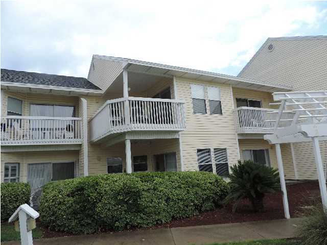 Great location for this fully furnished 2 bedroom, 2 bath condo overlooking the pool. Sandpiper Cove is a gated community featuring beach access, boat docking, tennis, pools, a small golf course and The Lagniappe Restaurant. Property being sold ''AS IS'' with right to inspect. Purchase this property for as little as 3% down.
