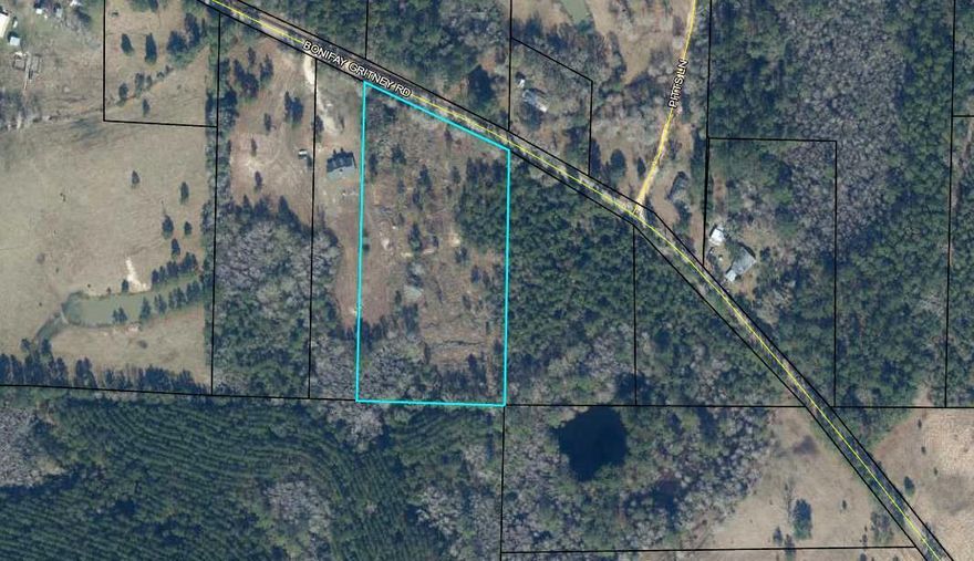 NICE FIVE ACRE TRACT -- in Caryville , FL.  Property is partially cleared and has a spring on it.