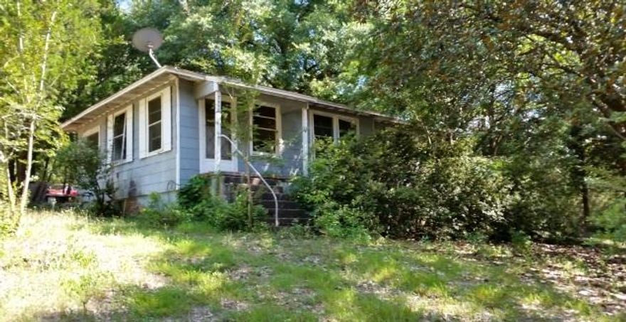 REO on a corner lot, beautiful mature trees line on the lot and street. Investors, have a look at this property!. Great starter home or investment property. Convenient location offers less than ten minutes from Winn-Dixie, Publix, Crestview High School, the Post Office, and the Marquis 10 Theater.