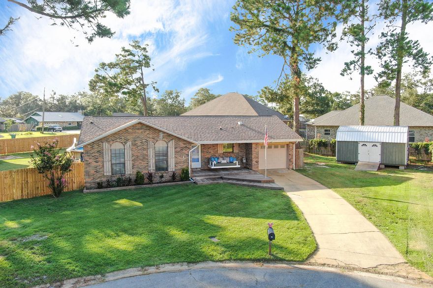 ALL BRICK HOUSE! Located in the heart of Niceville on a huge .39 acre lot, this refreshed ranch is ready for new owners. Upon entering you're welcomed by a spacious step down living room complete with new paint, crown molding, and stunning pecan LVP flooring. To your right the kitchen overlooks the front yard, includes a pantry, brand new Kenmore refrigerator and microwave. The one car garage connects to the kitchen and the laundry room for easy access when unloading groceries and laundry. Adjacent to the kitchen is a beautiful dining room with a chair rail, and area has been recently painted. All bedrooms are located on the left side of the house as well as the bathrooms. The bedrooms boast roomy closets and fresh paint. Two guest bedrooms have built in shelving, (CLICK MORE) and one bedroom has a built in desk area to keep your student focused while doing homework. The hall bathroom has been completely renovated into a timeless style, with new ceramic tile flooring, shower/tub, toilet, and hardware. The master bedroom also features the pecan flooring, new paint, and a big double window looking over the backyard. There is a 4' x 5' walk-in-closet. The master bathroom has been updated as well. A grand backyard offers plenty of room to add a kids play area, jungle gym, fort or sandbox area. Currently it has a back deck surrounding the above ground pool. A metal roofed covered "grilling hut", and fire pit to cook those oh so yummy smores! The entertaining area of the deck features surfboard shaped  wooden chairs with a solar screen covered area to provide some shade to keep the sun from parching you during these long Florida summer days. A new privacy fence (4 out of the 5 sides) surrounds the property, and has been pet tested (and approved). There is a storage shed in the backyard, perfect for storing pool toys, and lawn equipment. The property is conveniently located, close to Palm Plaza, and bayou access. It also close to schools, grocery stores, and parks. 
PLEASE NOTE: THE GREEN SHED, FRONT PORCH SWING & WASHER/DRYER ARE NOT INCLUDED IN THE SALE!