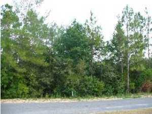Ready to Build Your New Home? This 2.5 acre wooded parcel is perfect for your dream home in the country but close to town!