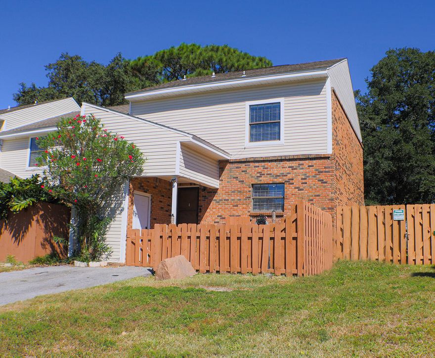 Larger than the others in this area, this beautiful townhome is an end unit, with a great community pool and close to everything in Fort Walton Beach & Shalimar. The townhome has undergone major updating such as new luxory vinyl flooring throughout, new kitchen cabinetry, quartz counters and new kichen appliances. In the bathroom the seller added quartz counters and a white cultured marble shower stall. This townhome has  2  large bedrooms on the 2nd floor. Downstairs is the main living area featuring the kitchen, living room, and half bathroom.