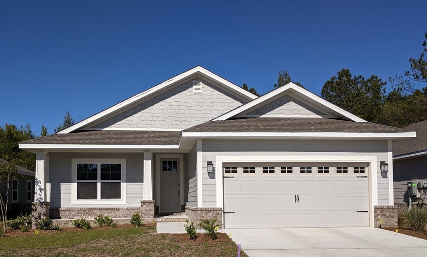 Lafayette Creek Landing! 70 acre, water access, neighborhood will have pool, clubhouse and community dock. Walk or ride a bike to Publix! Just a 15 minute drive south on 331 to Santa Rosa Beach!Room sizes are nice and large! Master Bedroom is 14'x22' allowing room for a sitting area 'retreat'. Covered patio is 10x17. Home includes granite counter tops in kitchen and baths, COREtec Pro Plus vinyl plank flooring in the main living areas, kitchen, laundry and baths, leaving carpet in only the bedrooms. The master bath features a garden tub and a separate shower with glass enclosure.Laundry room, just off the kitchen, includes ventilated shelving which can be used as a pantry or storage for small appliances.