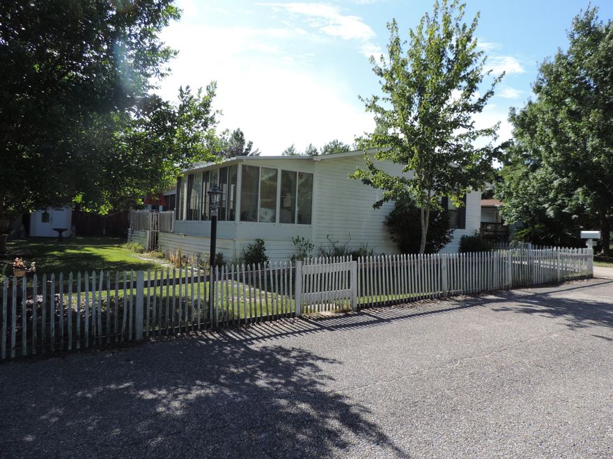 Where else can you find a 4 bedroom property for such a reasonable price? Ideally located between Hurlburt Field and Navarre Beach this home also enjoys Santa Rosa Sound access!! Lovingly cared for with a split bedroom design this home is ready to move in. Enjoy the large deck for entaining and BBQ's also a sunporch adjoins to enjoy both your morning coffee as well as the gentle Sound breezes. Your location is near WalMart as well as a short drive to Navarre Beach and Hurlburt. Two small storage buildings are located on the property as well as a workshop in the front of the carport. Call to schedule your private showing today