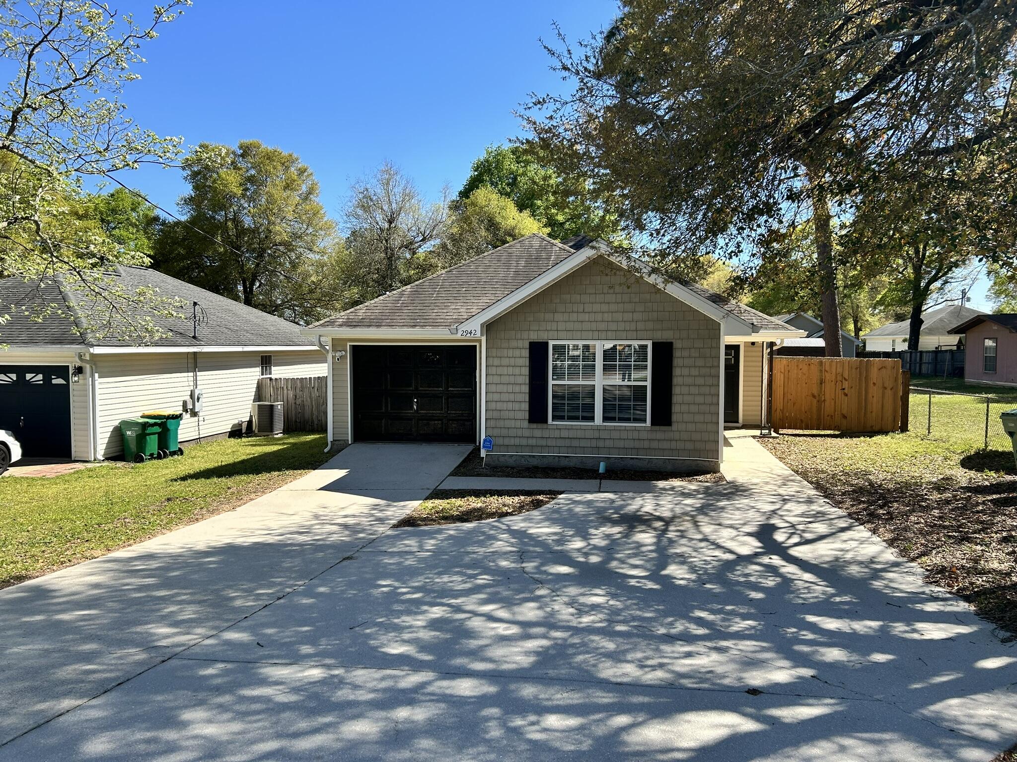 Welcome to 2942 Sholtz Avenue, a beautifully maintained 3-bedroom, 2-bathroom home in the heart of Crestview! This inviting property offers 1,200 sqft of comfortable living space, perfect for anyone looking for a peaceful retreat.Step inside to an open-concept layout featuring a bright and airy living room, a modern kitchen with ample cabinet space, and a cozy dining area ideal for gatherings. The spacious primary suite boasts an en-suite bathroom, while the additional bedrooms provide plenty of room for guests or a home office.Enjoy Florida's beautiful weather in the private backyard, perfect for entertaining or relaxing after a long day.
