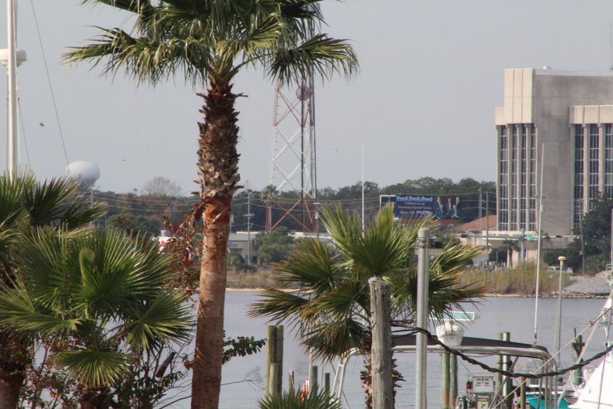 remodeled unit in highly desirable Finisterra Condo Complex. This 1 bedroom 1 bath looks out over the tennis courts and on to the water. The complex is in the process of being Gated which will surely add to the value. The complex also has a community pool and laundry facility.Properties like this rarely become available so call today for your private tour before its gone!