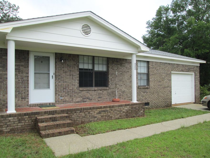 Escape the hustle and bustle of the city with this beautiful home out in the country! This home is located on just over two acres and boasts classic all-brick siding: a feature that will never go out of style. For your peace of mind, home includes both a NEW roof and AC unit (2016). Inside the home you will find a nicely sized living room. Cook up feasts in the kitchen store kitchen essentials in the pantry as well. A dining area is conveniently located just off the kitchen, where you can serve meals in spacious comfort. As the sun rises in the morning, relax on your open patio with a warm beverage and admire the beauty that surrounds you. Home also includes an RV hookup, so you can park your RV at home!