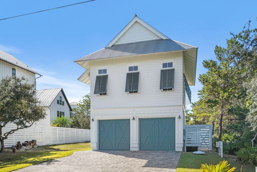 Welcome to 95 Seacrest Drive! With no HOA, this carriage house sits on a large 0.24 acre lot. Built in 2019, the spacious carriage house offers 1 bedroom, 1 bathroom, a two car garage & an outdoor patio with a custom fire pit. With plenty of room to build a large main house, this is an amazing building/investment opportunity. The beautiful carriage house provides immediate rental income to help offset your costs while you build. From this location, the beach access is only 800 ft away. And plenty of dining & shopping options are located nearby on the East End of 30A. Rosemary Beach, Seacrest Beach, Alys Beach, & The Big Chill are all conveniently positioned from this property. Backing up to the State Park nature preserve, Seacrest Drive has become one of 30A's premier streets with beautiful, large homes & convenient beach access. This property is being sold fully-furnished and offers strong rental income.