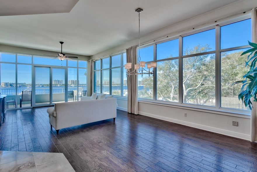 Here is a beautifully renovated, elegant and unique condo in the prestigious Destin Yacht Club at the east end of the Destin Harborwalk. This condo is unique in the building with it's lockout front balcony, 10ft ceilings, and expansive glass across the living and dining area showcasing incredible views over the Destin harbor and also overlooking the pool. All of the bathrooms and floors have been upgraded with wood and marble, and the kitchen is open to the dining and living area making entertaining easy and fun. The newly upgraded owners' amenities are spectacular! The owners have turned what was previously restaurant spaces into spaces used exclusively for the owners and their guests including a new fitness room, inside and outside bars, and lounging areas with a pool table and more!