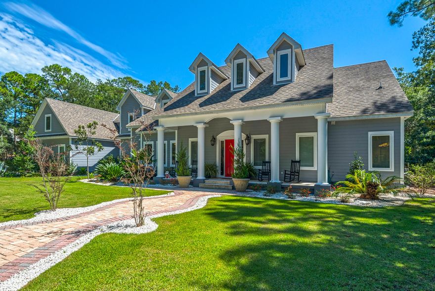 If you are looking for an incredible waterfront home w/ privacy, you need to take a look at this home. This Spectacular property has so many unique features such as Interior Venetian Plaster Walls, Travertine Flooring, Beautiful Light fixtures, High Ceilings, Crown Molding, Stunning new Kitchen and Pantry, plumbed Central Vac system, Super Large game room (Man Cave), 2 Offices, Bar, Mother In Law Suite, Private, Heated Swimming Pool & Hot tub, Outdoor Kitchen, TV & Fireplace, Workshop/Storage shed, Lots of Storage areas, Spray foam Insulation, Covered Boat dock w/ Water, Power & Boat Lift and is located on 2.53 acres. You will love the First floor Master Bedroom & living areas & the totally open concept this property provides. Great Neighborhood & Location. Most of Furnishings Included !. There are a total of 4 Fireplaces and there are ceiling fans in all bedrooms.  The Kitchen, including appliances and pantry, was completely renovated in 2016.  When current owner purchased this property in 2015, a majority of the second floor was unfinished. So most of the 2nd floor was finished in 2016. The unique tongue & groove pine HIGH ceilings make the second floor just an amazing retreat for fun.  The new outside deck is a great place to enjoy the sun and views of the backyard, bay and pool area. 

Pool is heated with propane and has a shelf that allows one to lay in a chaise while still being in the water.  Outdoor fireplace is wood burning while other 3 fireplaces are electric. There are 4 AC units which allow you to only cool the areas you need.  Spray Foam Insulation makes power bills very low. Boat Dock and 8000 lb. Boat Lift were added in 2017. Complete Interior of House was painted in 2016 and Exterior was completed painted in 2017. 

Having the circular driveway and plenty of open space provides ample parking and you will love seeing the deer walking through the property almost daily. Quiet Neighborhood with Association dues of only $50/year.  Convenient to Sacred Heart Hospital, Walmart and San Destin shopping and restaurants. Flood Insurance NOT required.

This amazing property has it all... Call today to see in person.