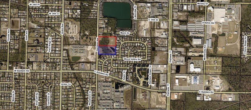 Great location for single family, townhomes or  multiple units. This property fronts on Harrison Ave as it comes to the end of it's North boundary. Dead end with not thru traffice. Centrally located makes it a perfect fit for some nice spacious lots for single family. Zoning allows for TOWNHOUSES too. The property has som CONSERVATION zoning on a portion of the propery.