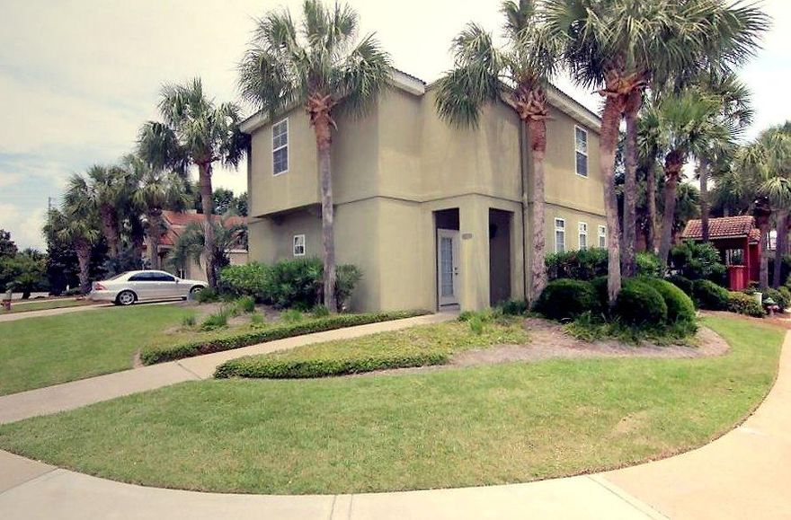 LARGE corner lot and adjacent to the neighborhood pool! This is a gorgeous two story Mediterranean style home with a very spacious floor plan. Designer touches throughout - cathedral ceilings in living room, gas fireplace, large kitchen with oak cabinetry, stainless appliances & granite countertops. Tile throughout the main floor. Outside features include - beautifully maintained landscaping, screened-in porch that overlooks the pool, outside shower, additional exterior storage, large driveway - could fit 6 cars. Tuscany is a gated neighborhood, south of Hwy 98 and only 1.5 blocks to the emerald green waters of the Gulf of Mexico.