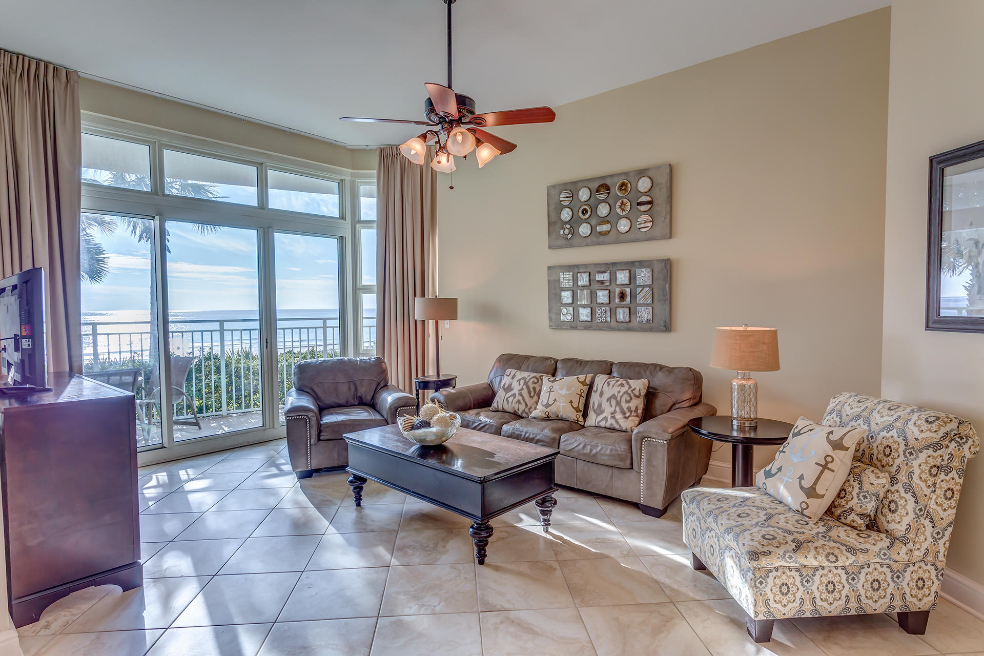 ONE OF A KIND FIRST FLOOR UNIT WITH 12 FOOT CEILINGS. MUST SEE TO APPRECIATE!! No need to wait for elevators in this amazing beach front home! This 1368 square foot floor plan is the largest 2 bedroom w/ bunk in AQUA, and the high ceilings make it seem even larger. The furnishings and decor are classy and your condo is ready for superior rental income. Truly an outstanding home in one of the best locations on the beach. AQUA has been recognized as the best of the best on Panama City Beach two years in a row. The location, so close to Pier Park, the distinctive architecture, the amenities, the rental potential, high quality construction, all help to create a community that truly stands out on the beach. This home is waiting for the right person to appreciate it.