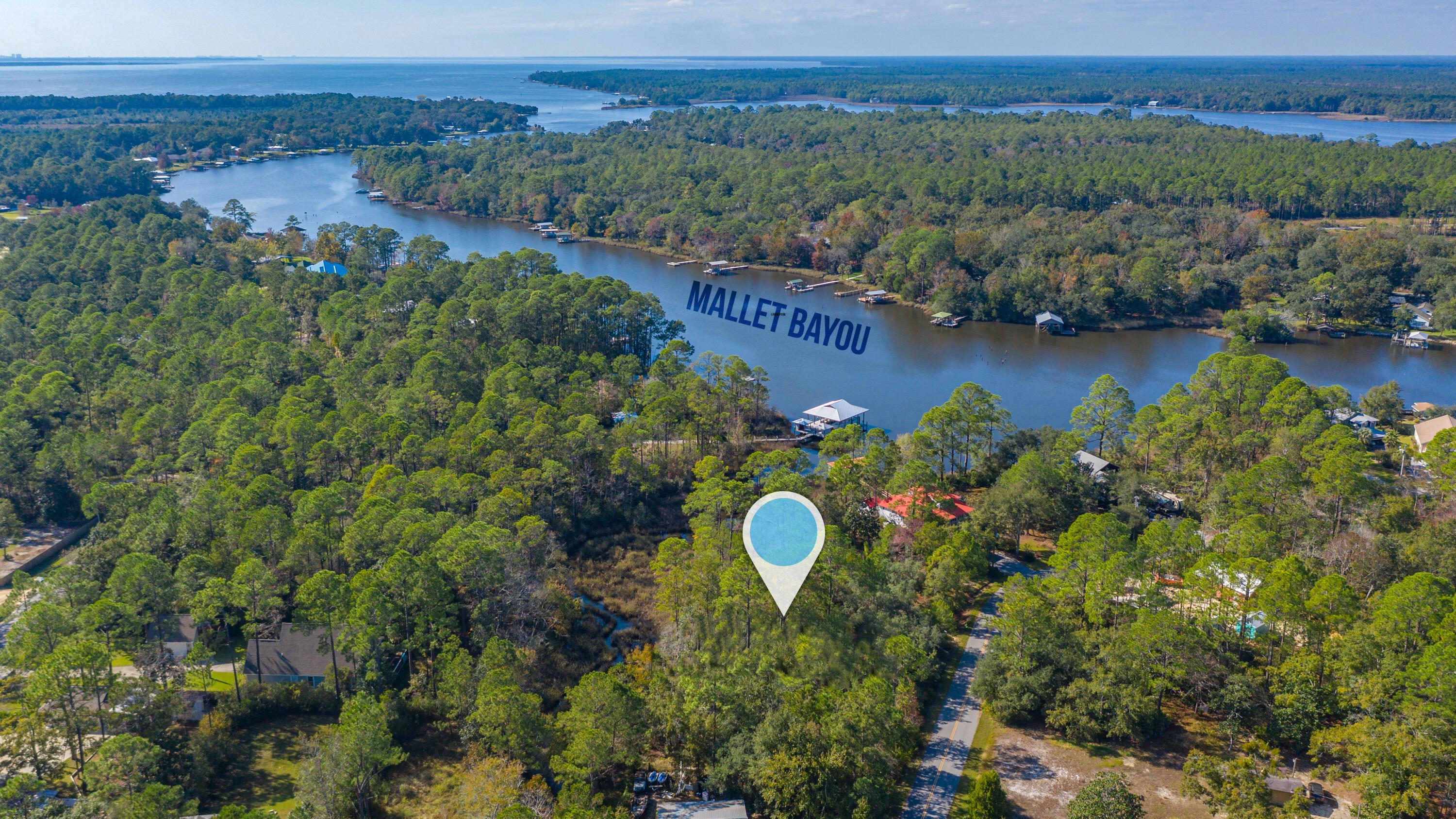 Lots 11 and 12 Bayou Circle are located on the end of one of the most desirable bayous in Freeport. Offering over a half of an acre with covenants but no HOA, you get the best of both worlds. There is no other place to get .65 acres of waterfront property in as nice of a location. Lot 11/12 is also for sale in conjunction with Lots 10 and 13 to provide 1.24 acres of serene waterfront property in one of the fastest growing areas in Northwest Florida. Just a few miles across the 331 bridge to the Beaches of South Walton, yet far enough away to get away from the hustle and bustle of the tourist.